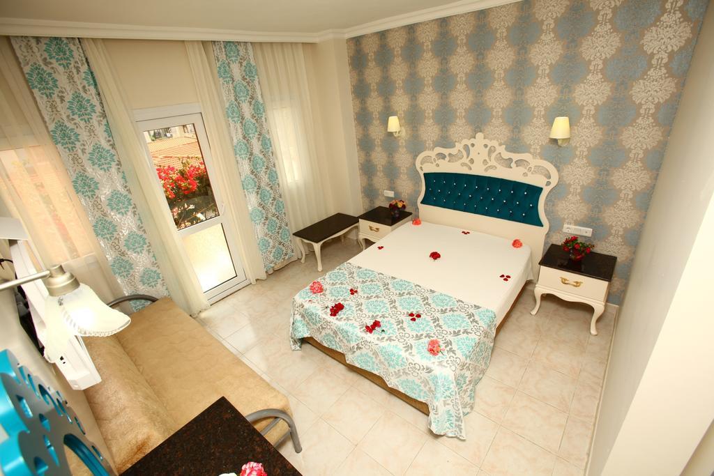 Turk Hotel Ölüdeniz Habitación foto
