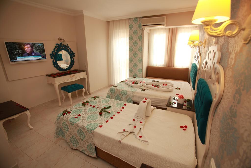 Turk Hotel Ölüdeniz Habitación foto
