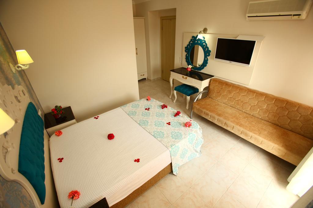 Turk Hotel Ölüdeniz Habitación foto
